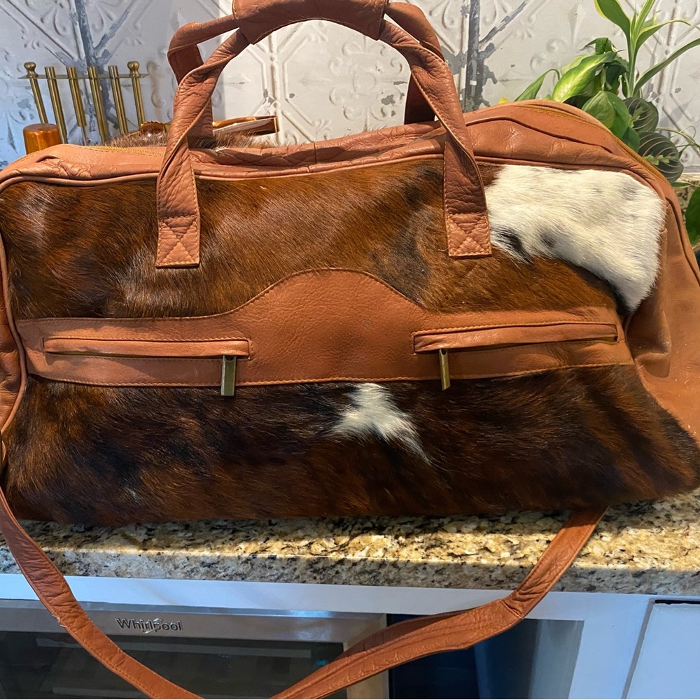 Cowhide and leather weekender